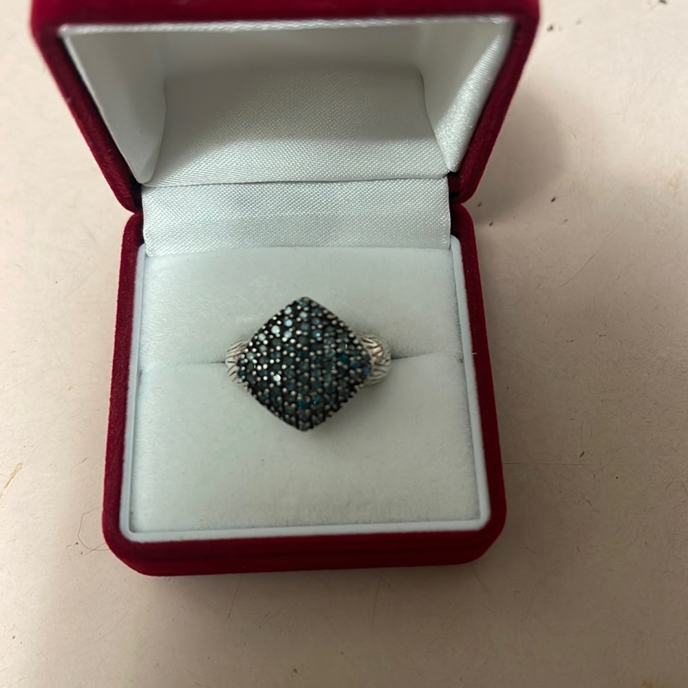 925 sterling silver with blue diamonds